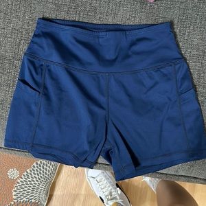 Short biker shorts- worn a few times, satin material and pockets